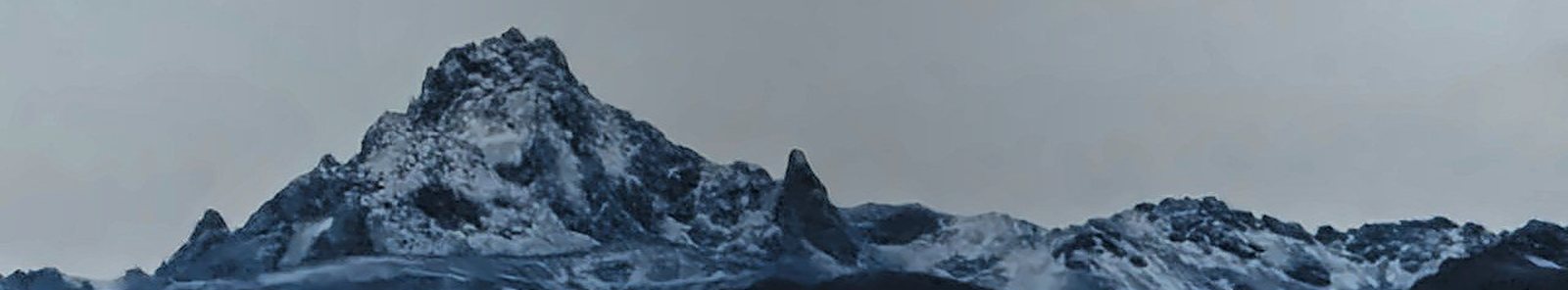 Batian, Nelion and Point Lenana on Mount Kenya at dusk, seen from the Nanyuki side